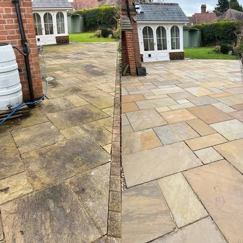 Before and after comparison of patio cleaning showing dirty left side and clean right side of stone pavers